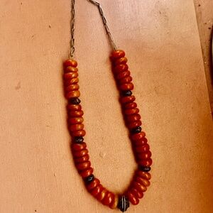 Moroccan amber colored plastic bead and metal accent beads necklace